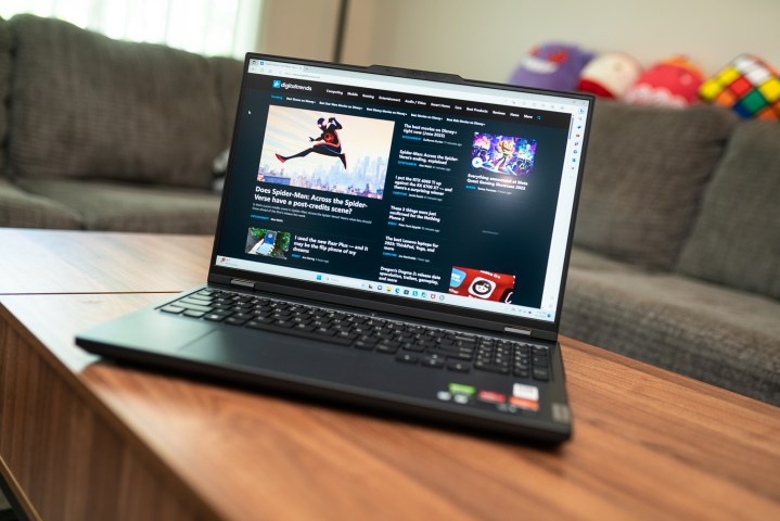 Lenovo Legion Pro 5 with the Pro Well Tech website.