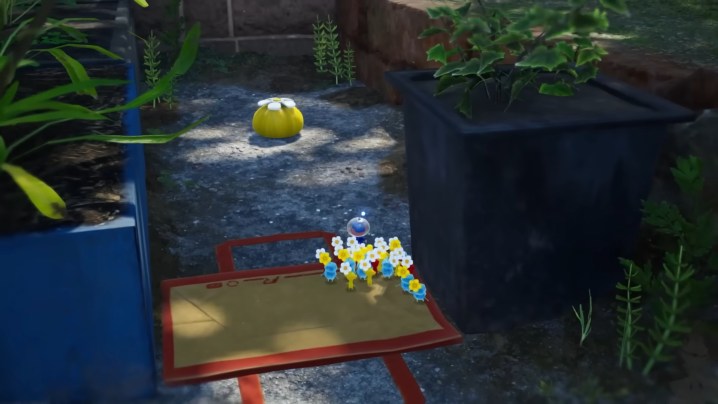 A crewmember approaching a yellow onion in Pikmin 4.