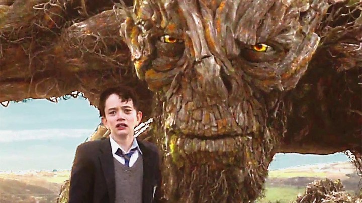 Lewis MacDougall and the monster in A Monster Calls.