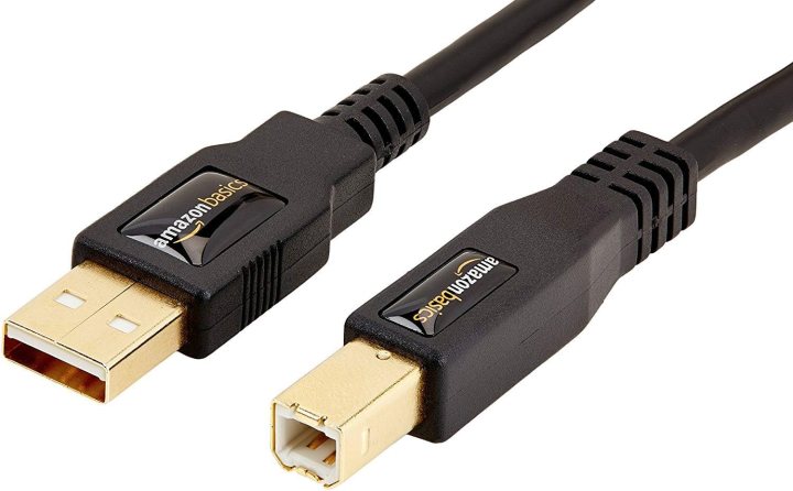 A USB printer cable has a USB-A connector at one end and a USB-B connector at the other end.