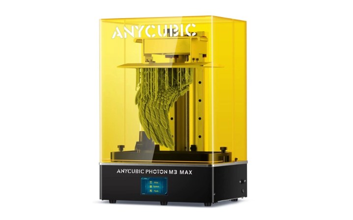 The Anycubic Photon M3 Max displayed with a print featuring feathers.