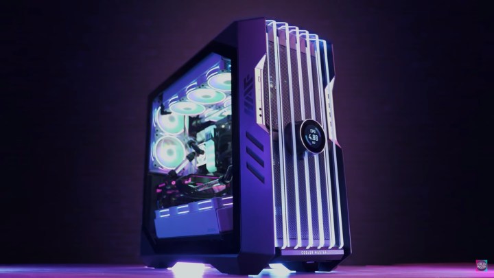 A huge Cooler Master full tower PC case sits on a table.