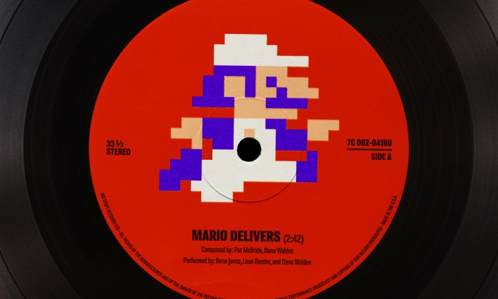 A pixelated Mario appears on a red vinyl record label.