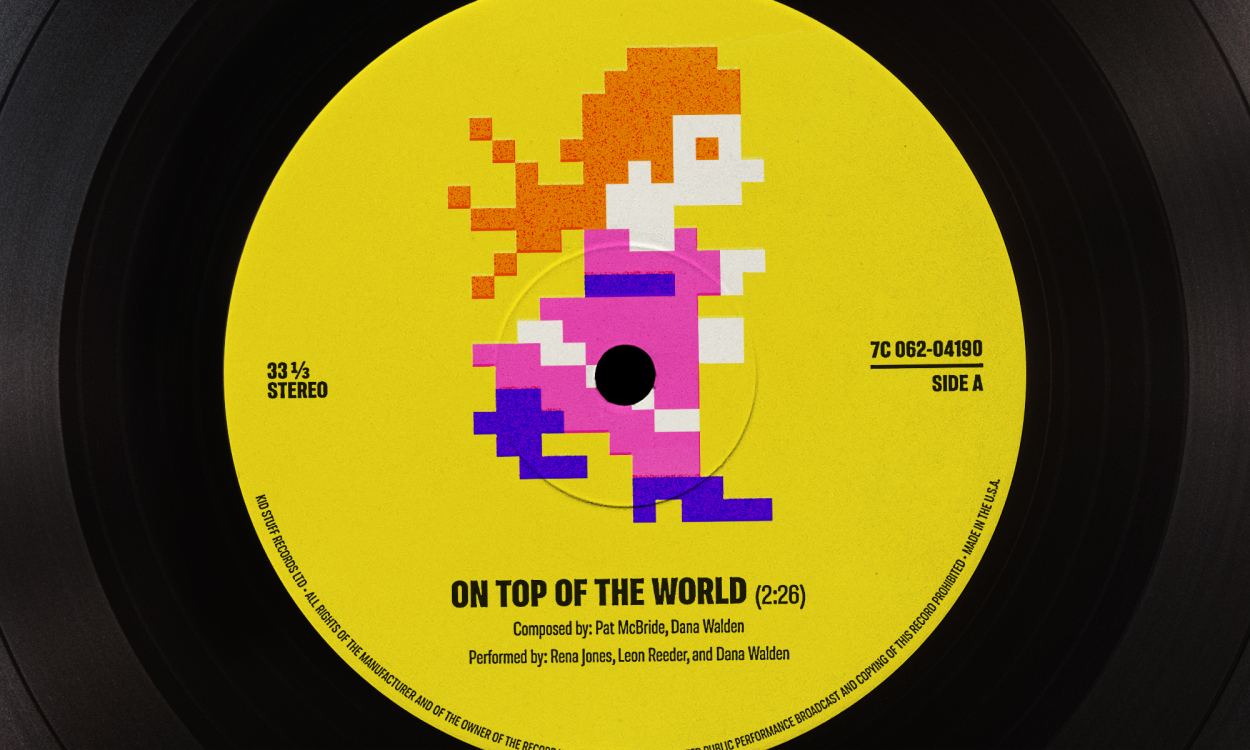 A pixelated Princess Peach appears on a vinyl record label.