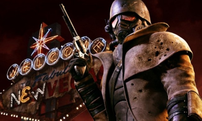 The courier in his nuclear gear and holding his gun in Fallout: New Vegas key art.