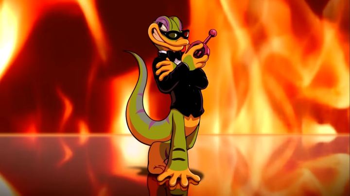 Gex holding a remote in the Gex Trilogy's reveal trailer.