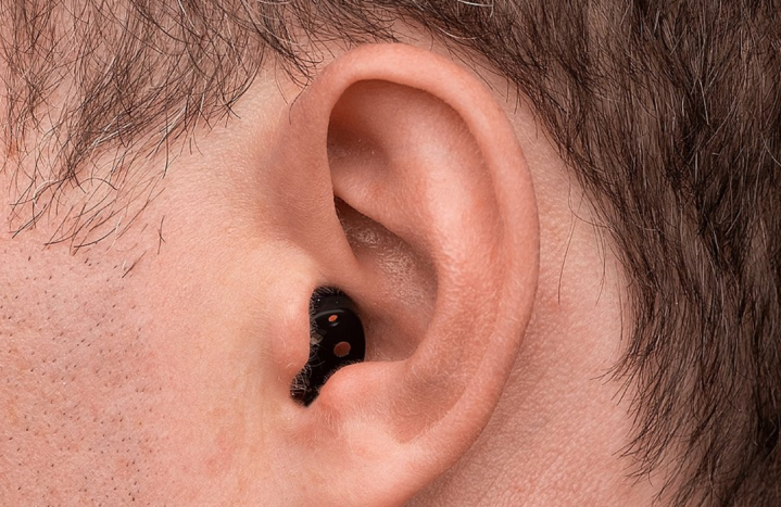 A person wearing the Go Hearing - Go Lite OTC Hearing Aids.