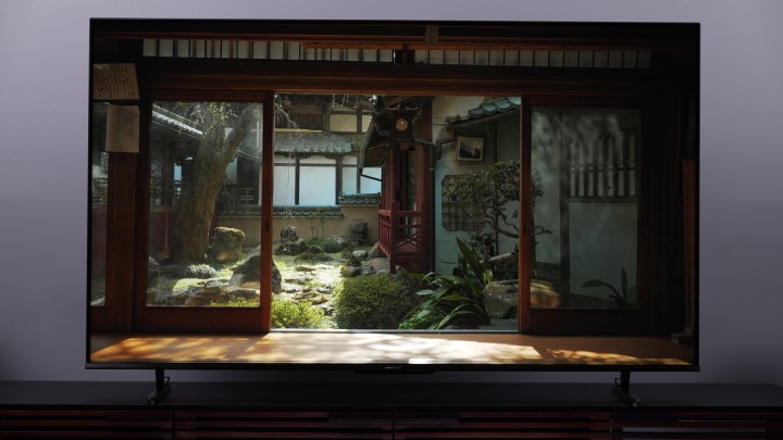 A view of a Japansese courtyard looking from within a house displayed on a Hisense U8K.