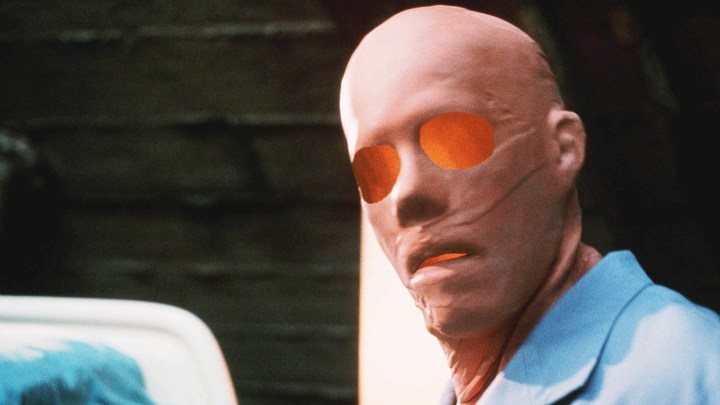 An invisible man wears a human mask in Hollow Man.