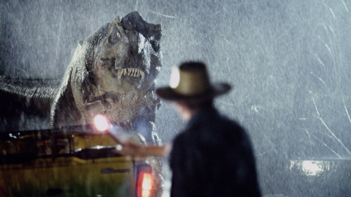 Sam Neill regarde le puissant T. Rex dans "Jurassic Park".