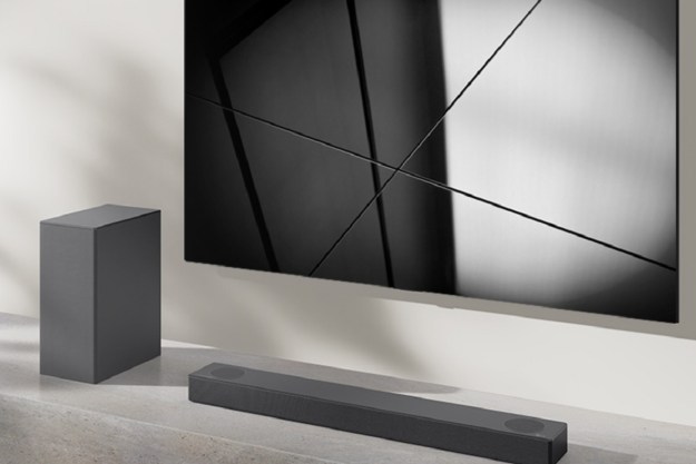 The LG S75Q 3.1.2-channel soundbar with subwoofer with a TV.