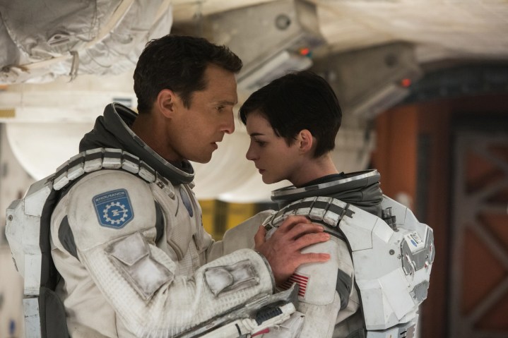 Matthew McConaughey grips Anne Hathaway's shoulders in Interstellar.