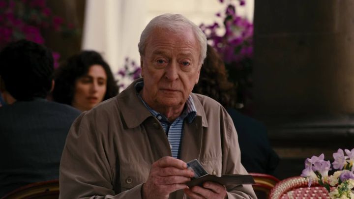 Michael Caine as Alfred at a restaurant in "The Dark Knight Rises."