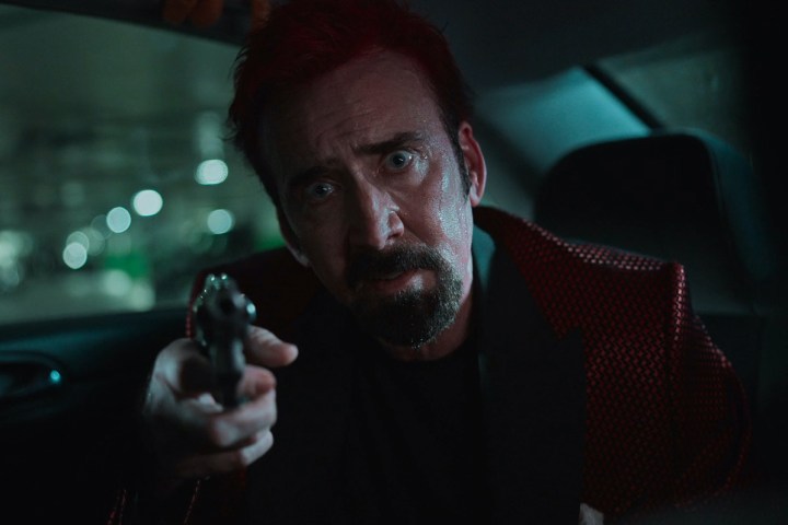 Nicolas Cage points a gun in Sympathy for the Devil.