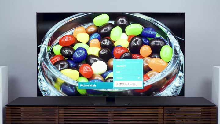 Picture mode settings are shown over an image of jelly beans on a Samsung QN90C. 