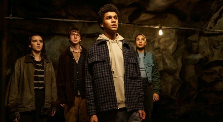 4 teenagers stand looking shocked in Harlan Coben's Shelter.