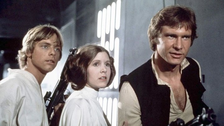 Mark Hamill, Carrie Fisher, and Harrison Ford as Luke, Leia, and Han in Star Wars.
