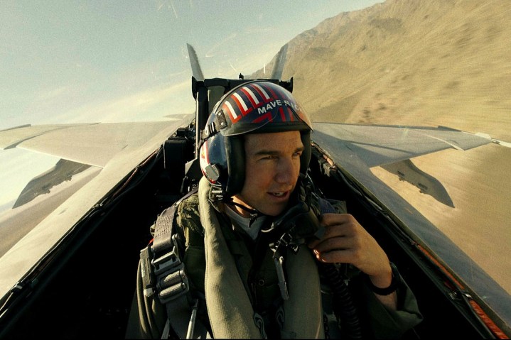 Tom Cruise flies a jet in Top Gun: Maverick.