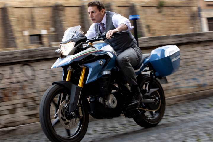 Tom Cruise rides a motorcycle in Mission: Impossible - Dead Reckoning Part One.