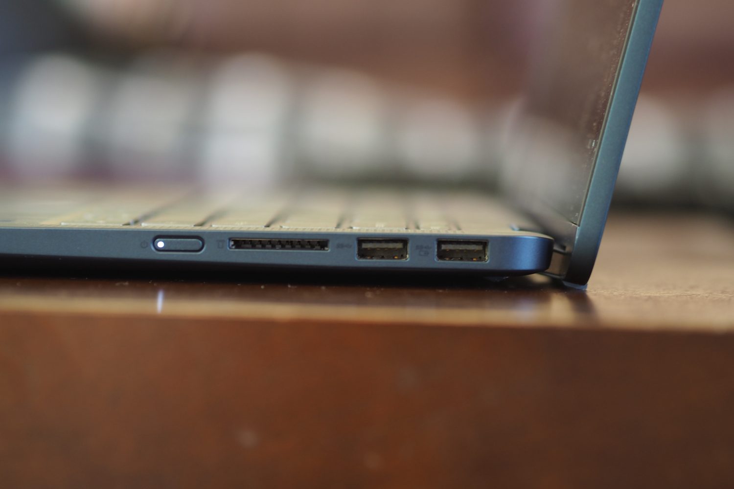 Lenovo Flex 5i 14 2023 side view showing lid and ports.