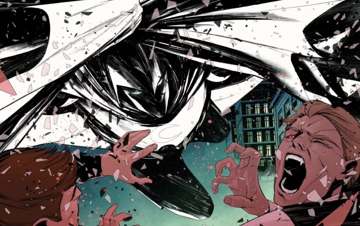 Moon Knight battles 2 vampires in a Marvel comic book.