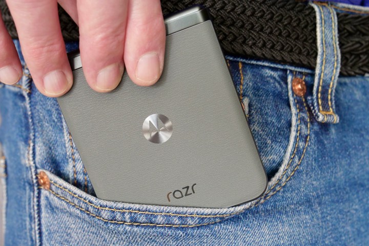 A person taking the Motorola Razr 40 out of a pocket.