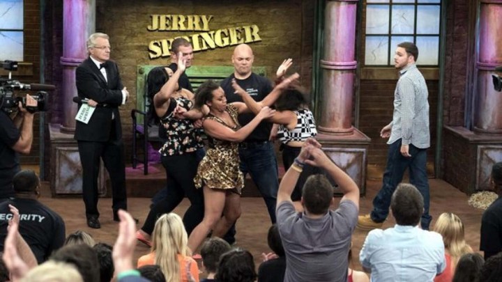 A fight breaking out on stage in an episode of The Jerry Springer Show.
