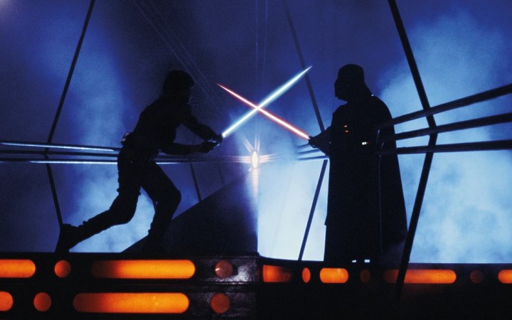 Luke Skywalker lunges towards Darth Vader during their lightsaber fight on Cloud City.