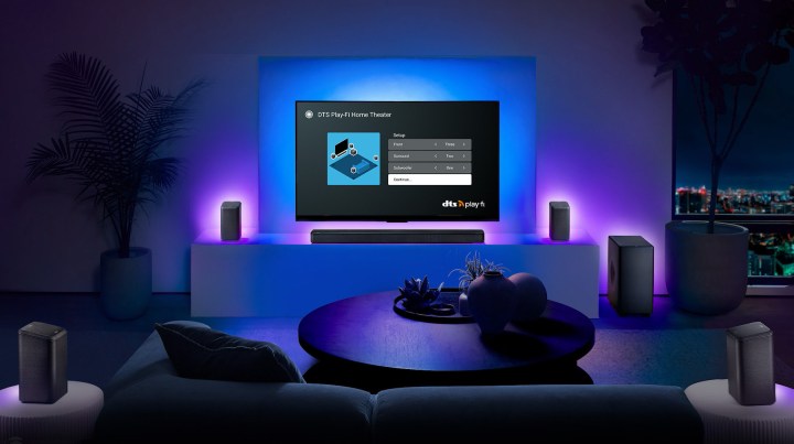 A DTS Play-Fi-equipped TV shown in a living room with Play-Fi compatible wireless speakers.