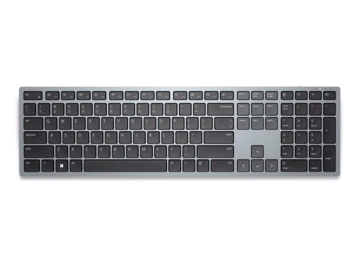O teclado sem fio para vários dispositivos Dell KB700 contra um fundo branco.