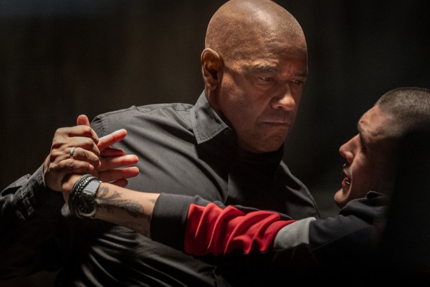 Denzel Washington twists a gangster's wrist in The Equalizer 3.