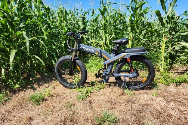 engwe x24 e bike review full on left side shot against cornfield background