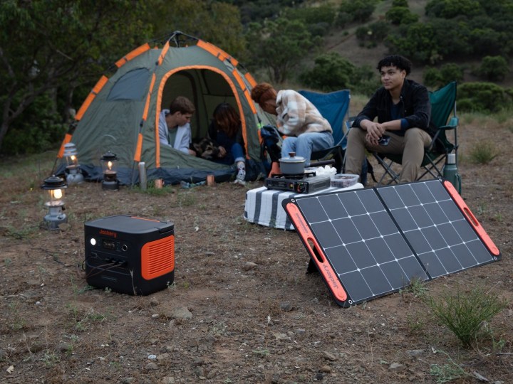 Jacker 1000 Plus Solar Generator used while camping lifestyle image.