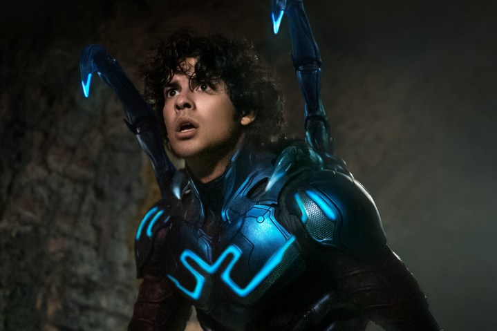Jaime Reyes wears his super suit in Blue Beetle.