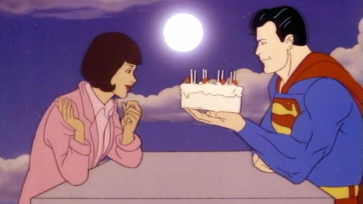 Lois Lane and Superman sharing a brithday cake in the 1988 animated series Superman.