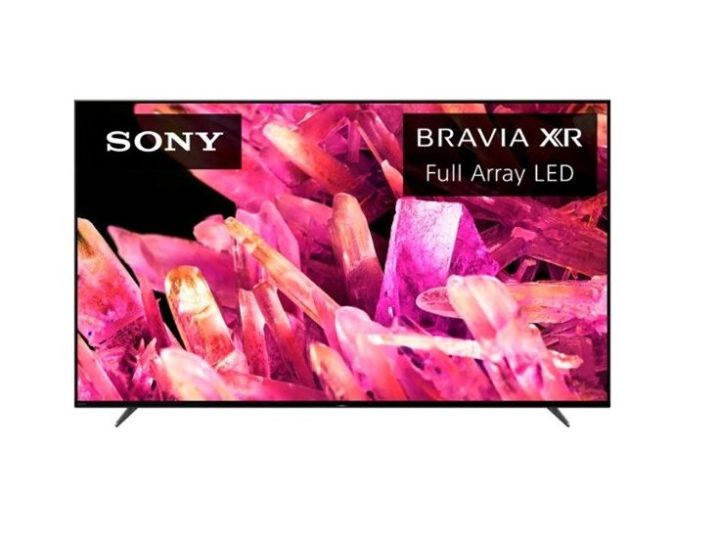 The Sony 75-Inch Class BRAVIA XR X90K Google TV with an image of bright, pink crystals on the screen.