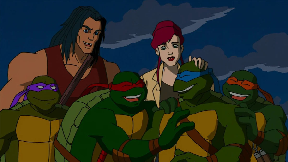 Casey e April comemoram com o TMNT em Teenage Mutant Ninja Turtles.
