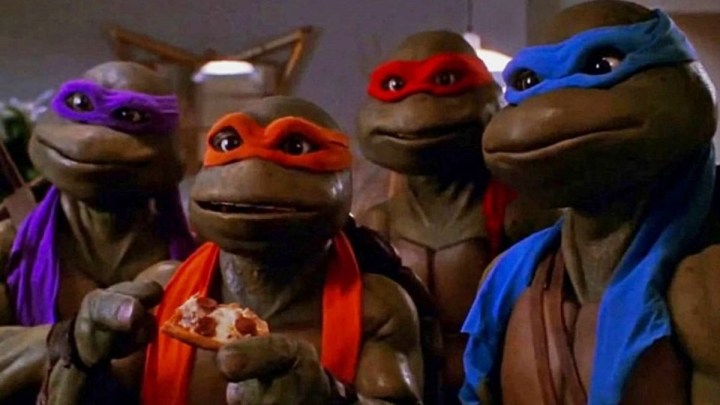The Turtles enjoy some pizza in Teenage Mutant Ninja Turtles.