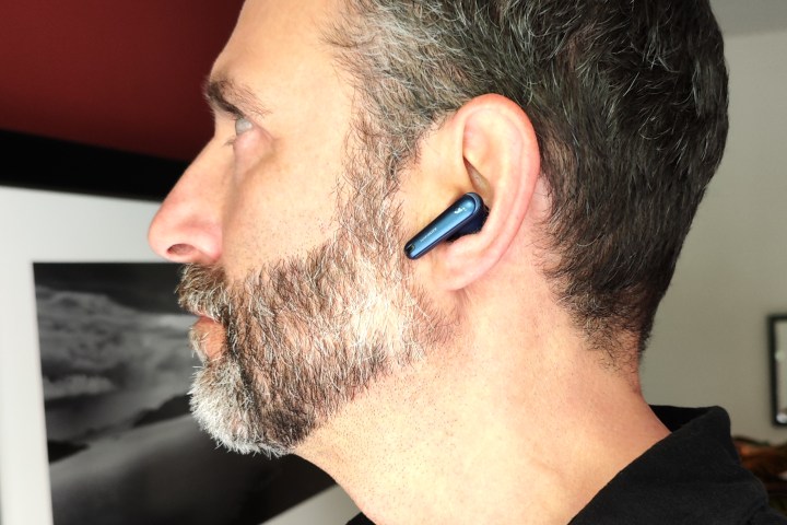 Side view of man wearing Anker Soundcore Liberty 4 NC.