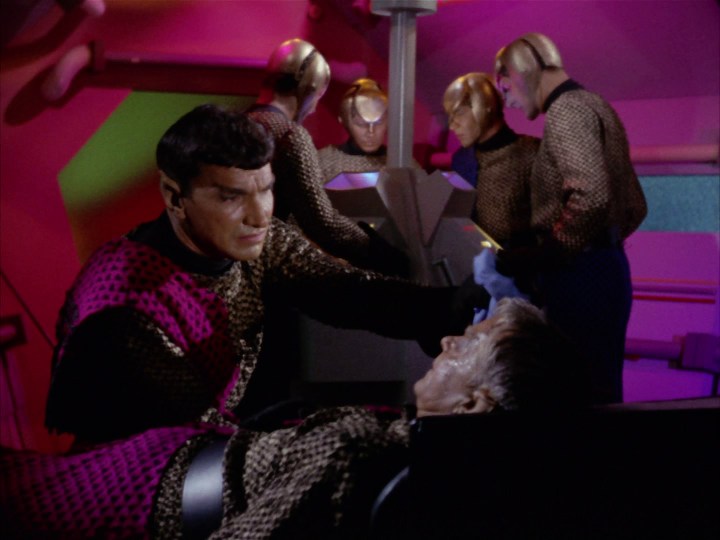 The Romulan Commander stands over his wounded friend in the Star Trek episode "Balance of Terror"