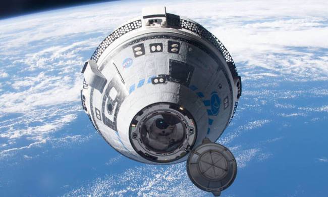 Boeing's Starliner spacecraft at the space station during an uncrewed test flight.