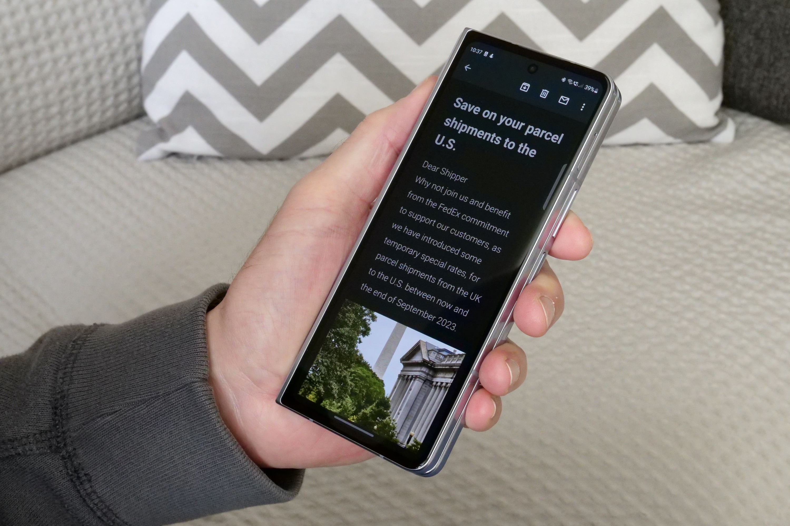 Reading an email on the Samsung Galaxy Z Fold 5's cover screen.