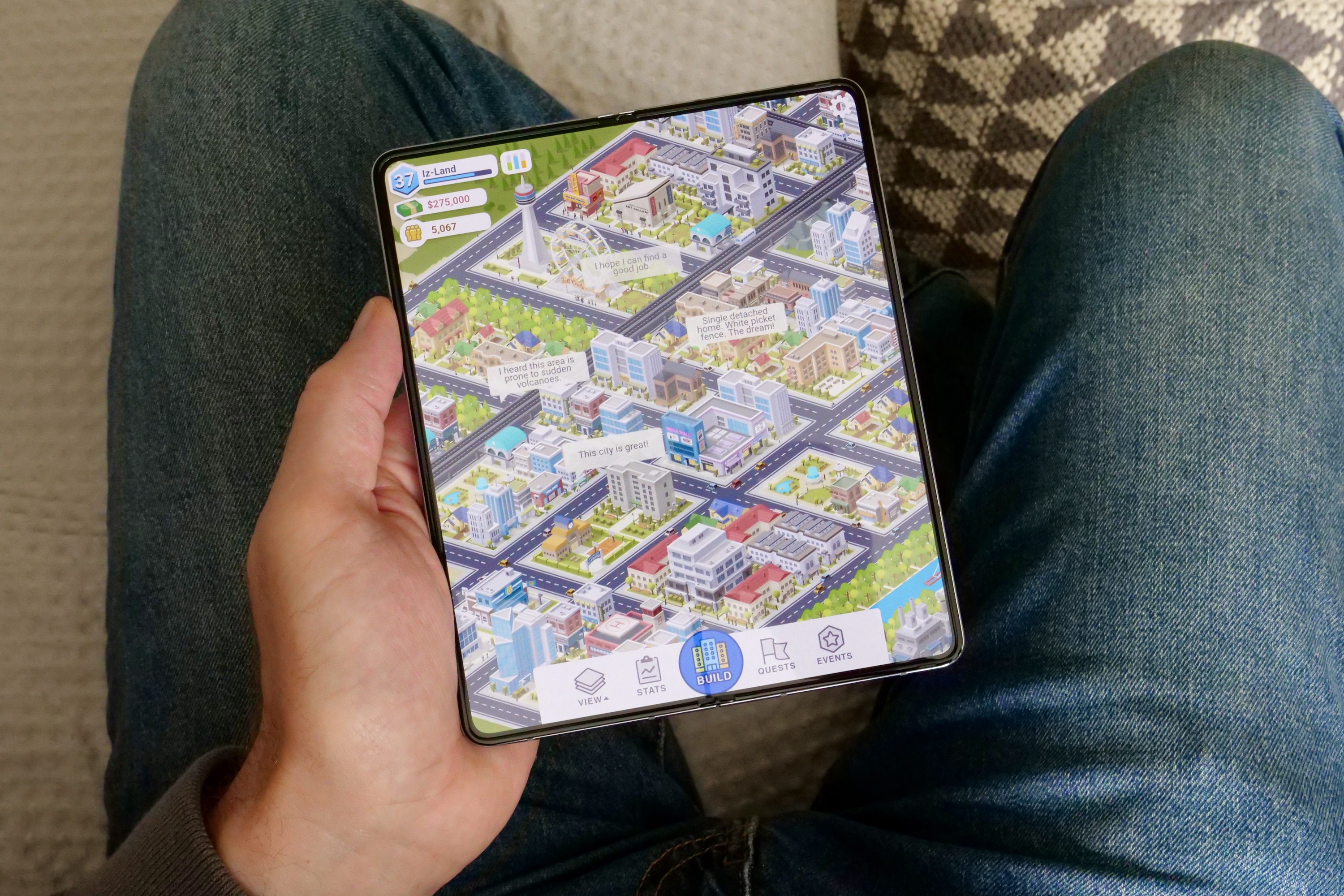The Pocket City game on the Samsung Galaxy Z Fold 5's open screen.