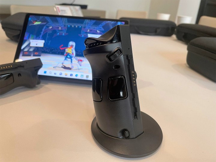 A Lenovo Legion Go controllers stands up on a table.