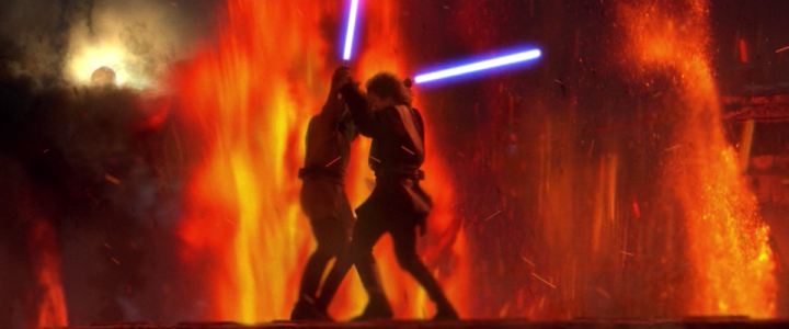 Obi-Wan Kenobi and newly minted Darth Vader grapple before a lava plume on Mustafar in Revenge of the Sith