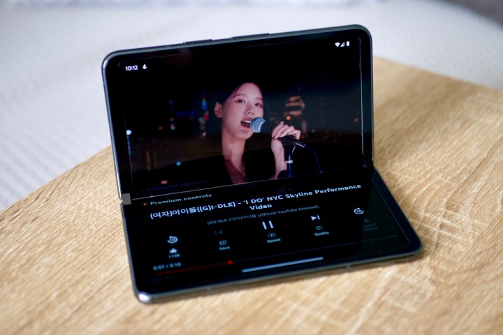 A video playing on the Google Pixel Fold, with the screen half open.