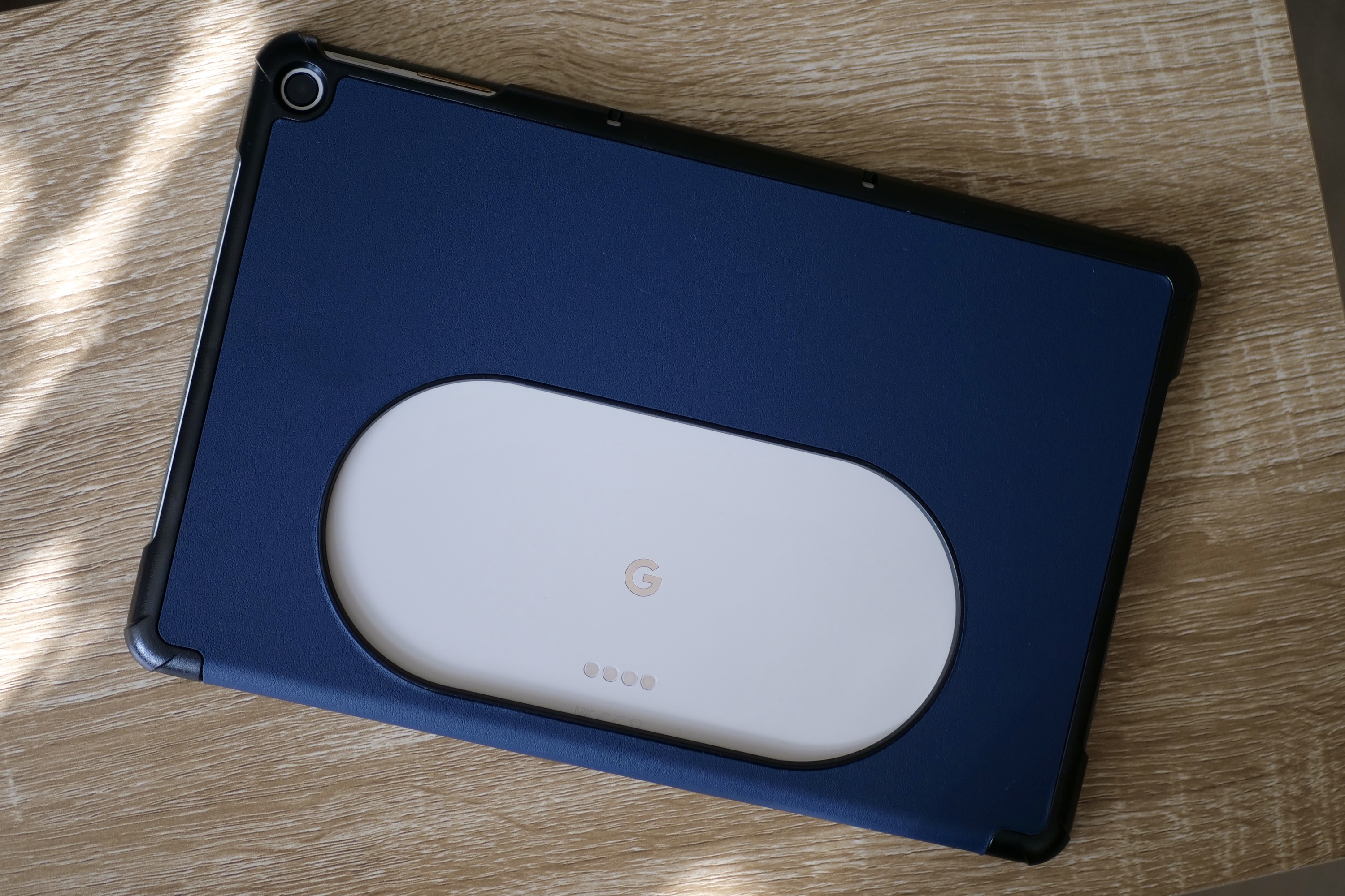 The back of the Pixel Tablet in a case.