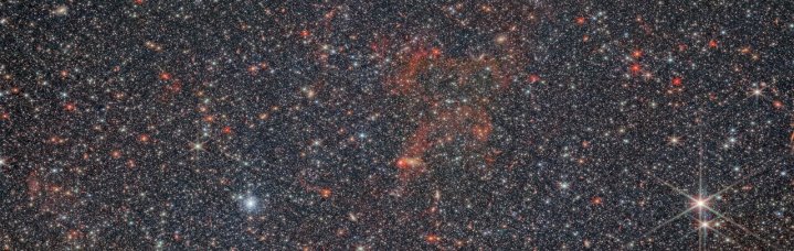 Cette image à l'échelle montre la galaxie irrégulière NGC 6822.