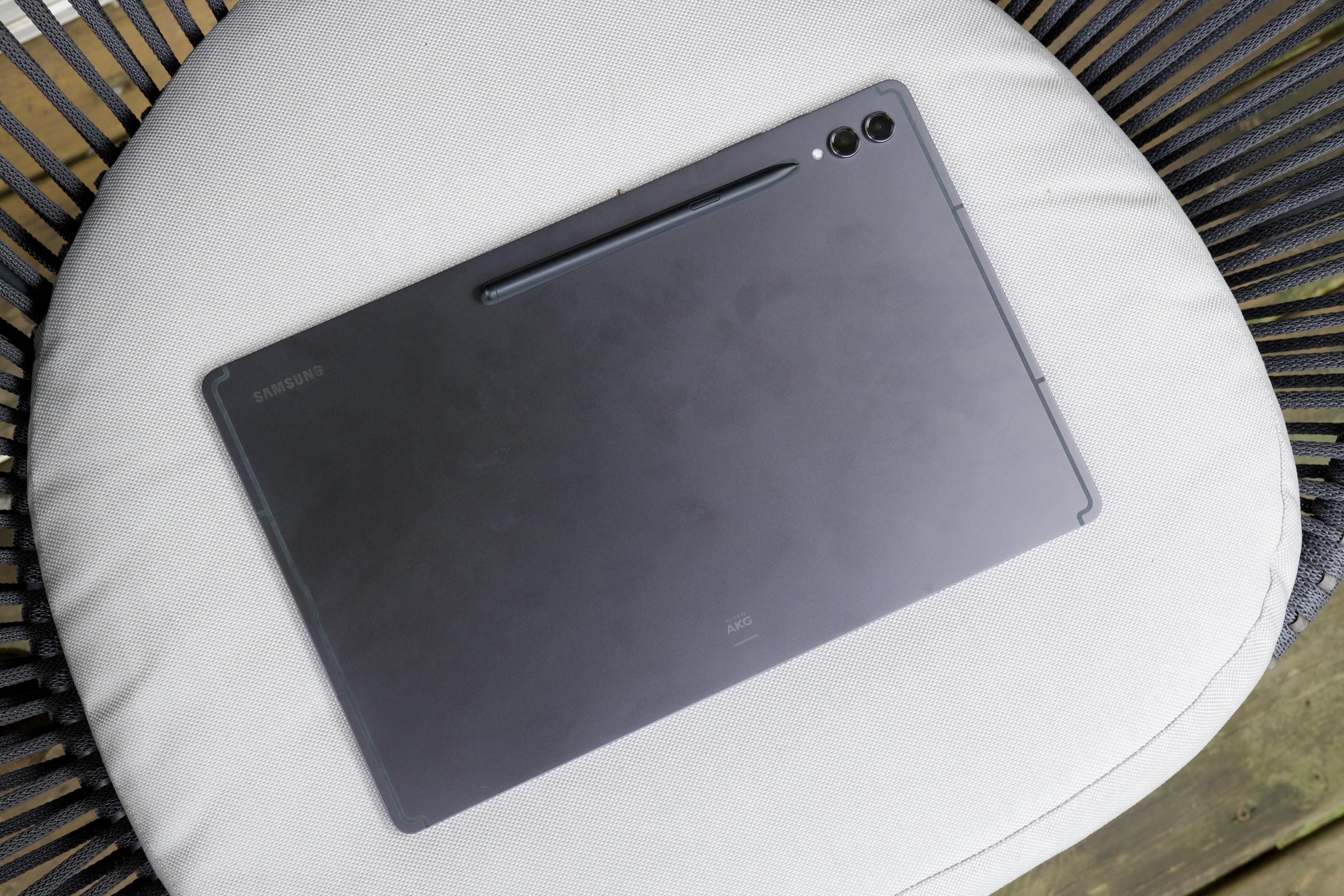 The back of the Samsung Galaxy Tab S9 Ultra, lying face-down on a chair.