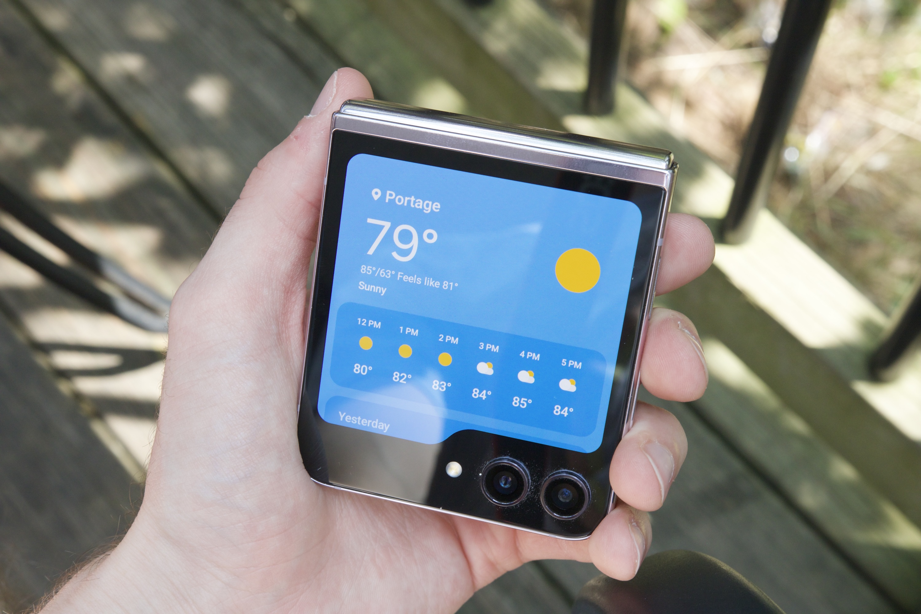 Weather widget on the Samsung Galaxy Z Flip 5 cover screen.